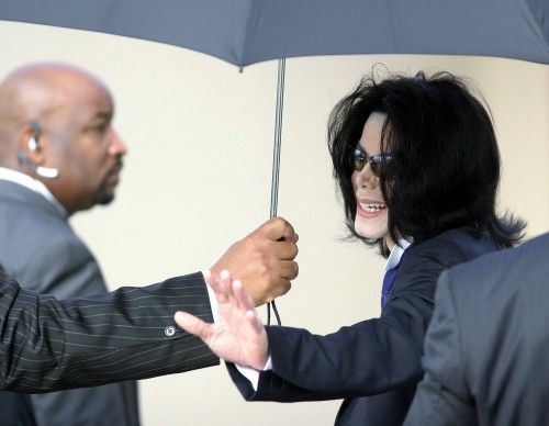 SANTA MARIA, CA - April 20: Michael Jackson waves to his supporters as he arrives outside the Santa 