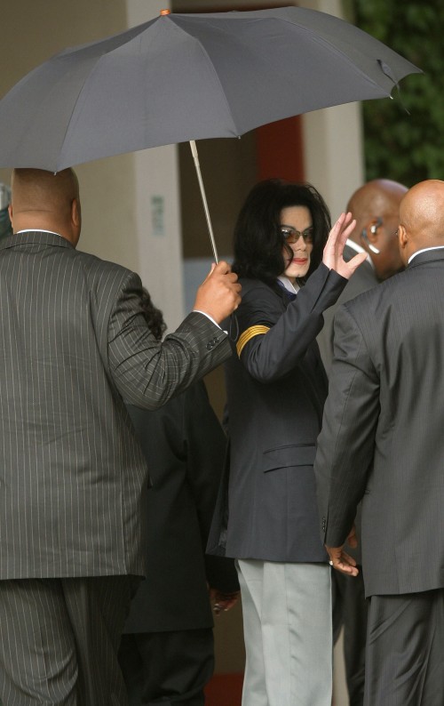 SANTA MARIA, CA - April 20: Michael Jackson waves to his supporters as he arrives outside the Santa 