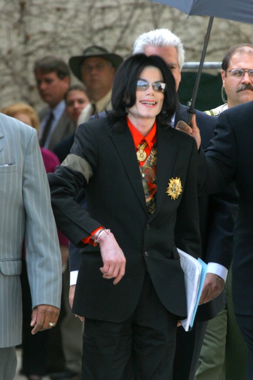 SANTA MARIA, CA-FEBRUARY 14: Pop Star Michael Jackson was flanked by attorneys and bodyguards as he 