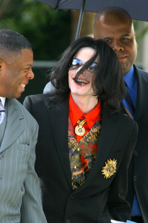 SANTA MARIA, CA-FEBRUARY 14: Pop Star Michael Jackson was flanked by attorneys and bodyguards as he 