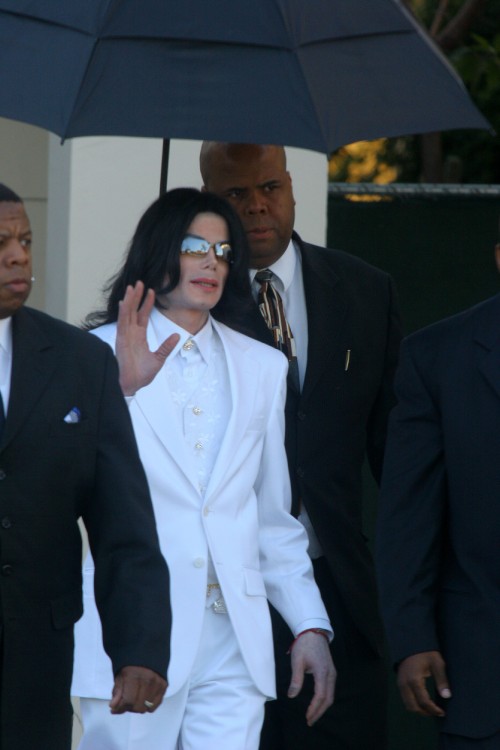 SANTA MARIA, CA JANUARY 31 : Pop Star Michael Jackson is surrounded by body guard as departs the San