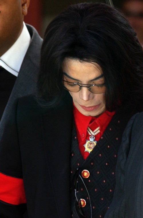 US pop star Michael Jackson exits the Santa Barbara County Courthouse after day 19 of his child mole