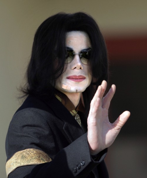 SANTA MARIA, CA - MARCH 25: Michael Jackson arrives at  the Santa Barbara County Courthouse with a b