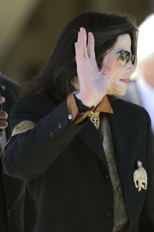 SANTA MARIA, CA - MARCH 25: Singer Michael Jackson, with a bandage on his face, leaves the Santa Bar