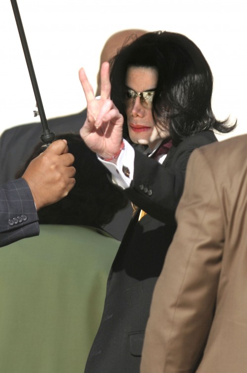 SANTA MARIA, CA - May 12: Michael Jackson waves to his supporters as he arrives outside the Santa Ba