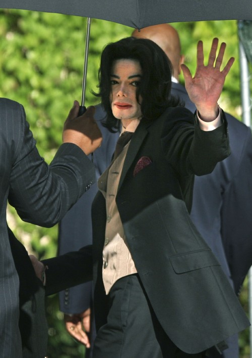 SANTA MARIA, CA - MAY 18: Michael Jackson waves to his supporters as he arrives outside the Santa Ba